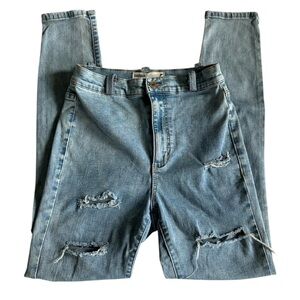 Garage Light Wash Distressed Skinny Jeans